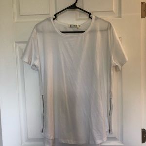 Mshing white top with zippers coming down sides